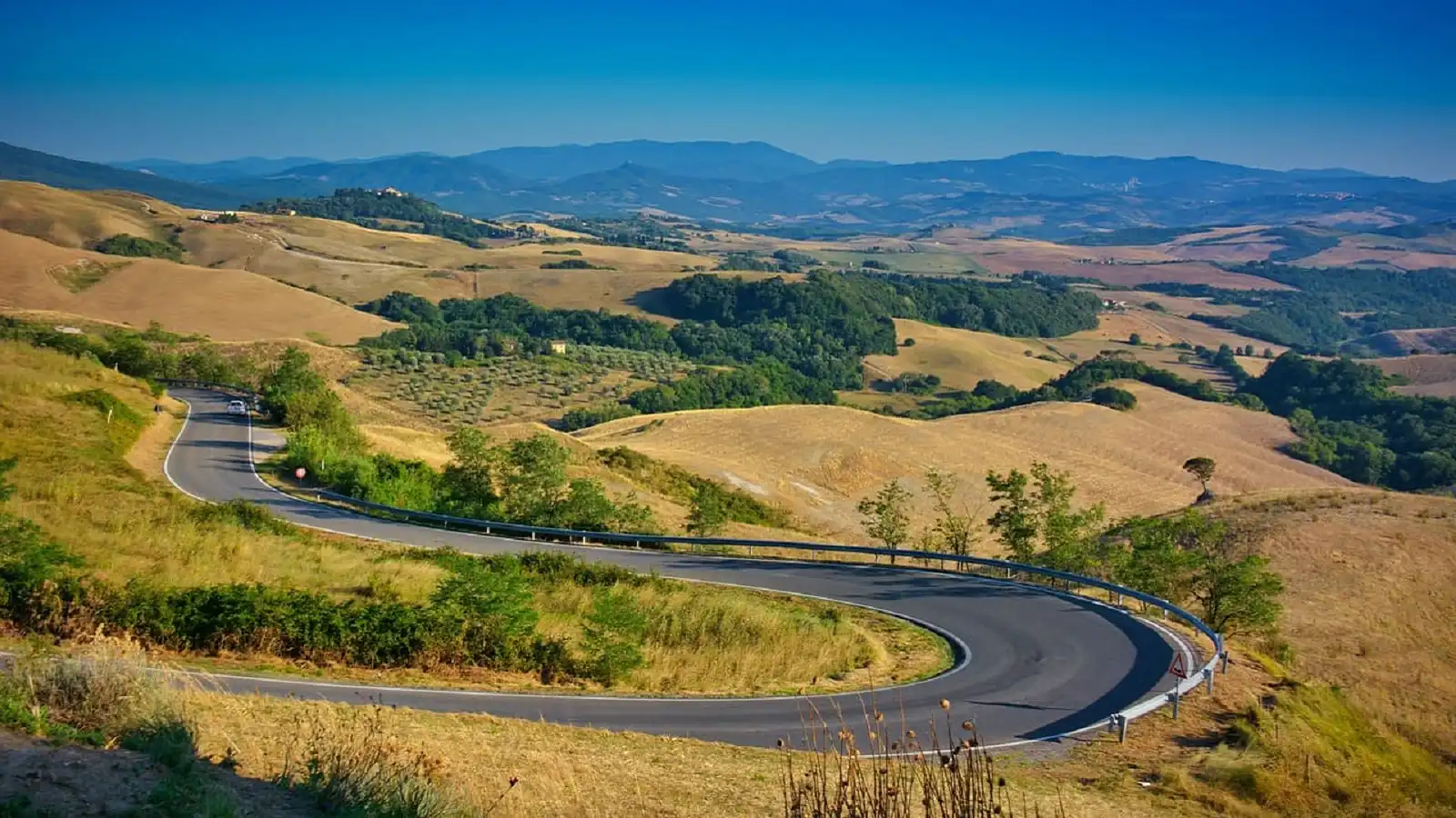 The Best Driving Roads in Tuscany (And Why Driving Enthusiasts Keep Coming Back) - Article Banner